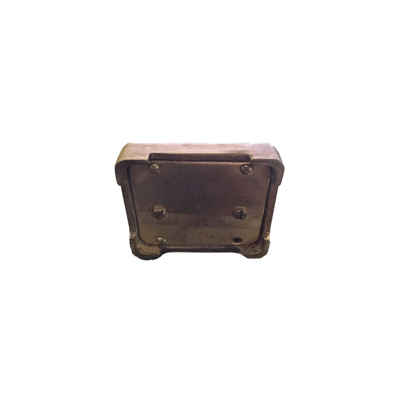 Metallic rectangular object with rounded edges on a white background