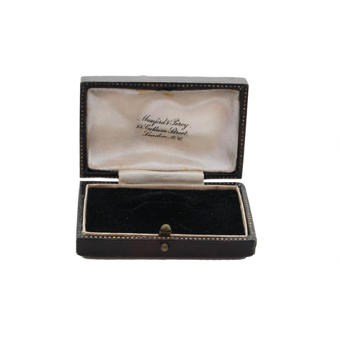 Open jewellery box with 'Mumford & Percy' branding on a white background