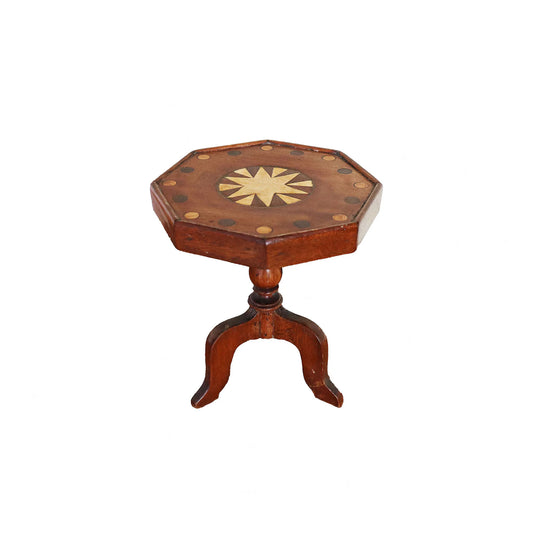 Wooden octagonal side table with decorative top on a white background
