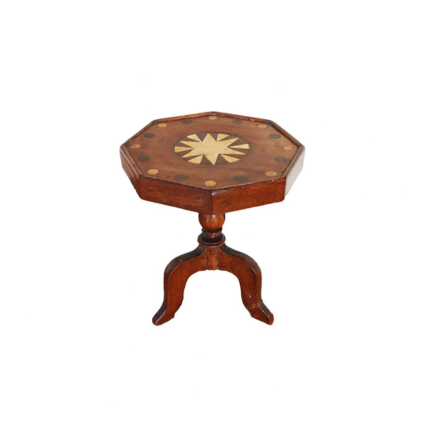 Wooden octagonal side table with decorative top on a white background