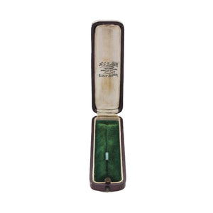 Open case with green interior and visible branding on a white background