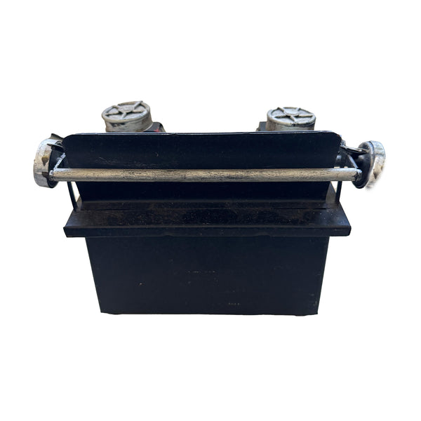 A metal vintage typewriter shop display model circa 1930s the back view