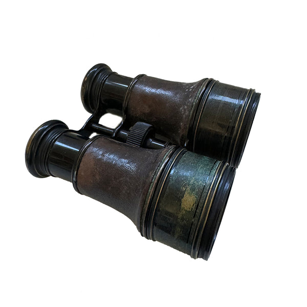 Vintage binoculars on a white background