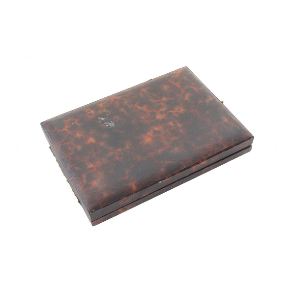Tortoiseshell style case on a white background