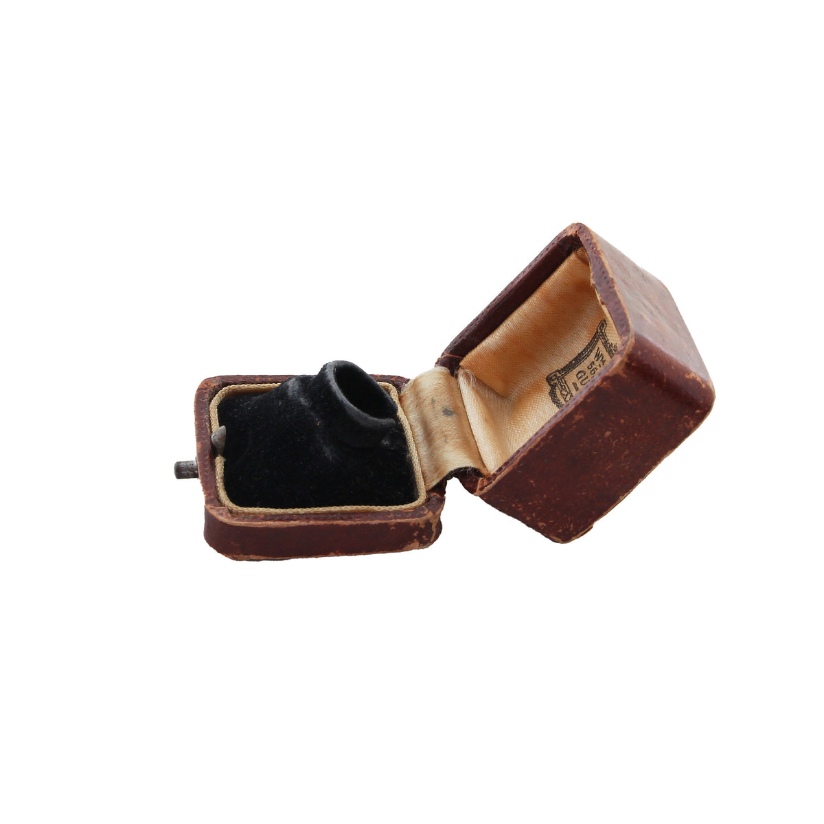 Open brown jewelry box with a black interior on a white background