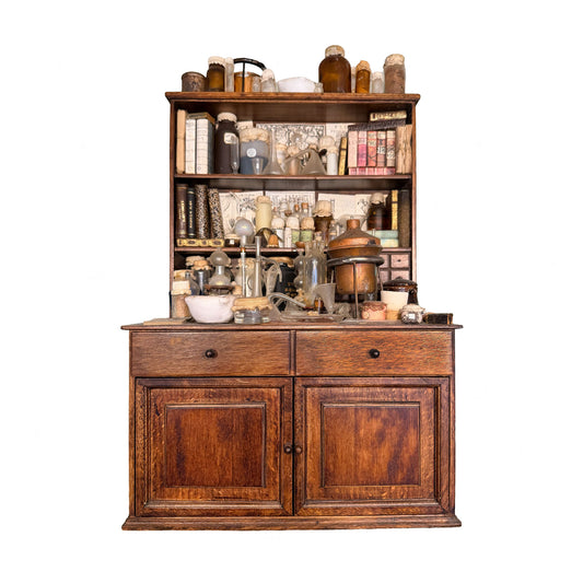 a miniature laboratory by Ettore sombrero on a white background
