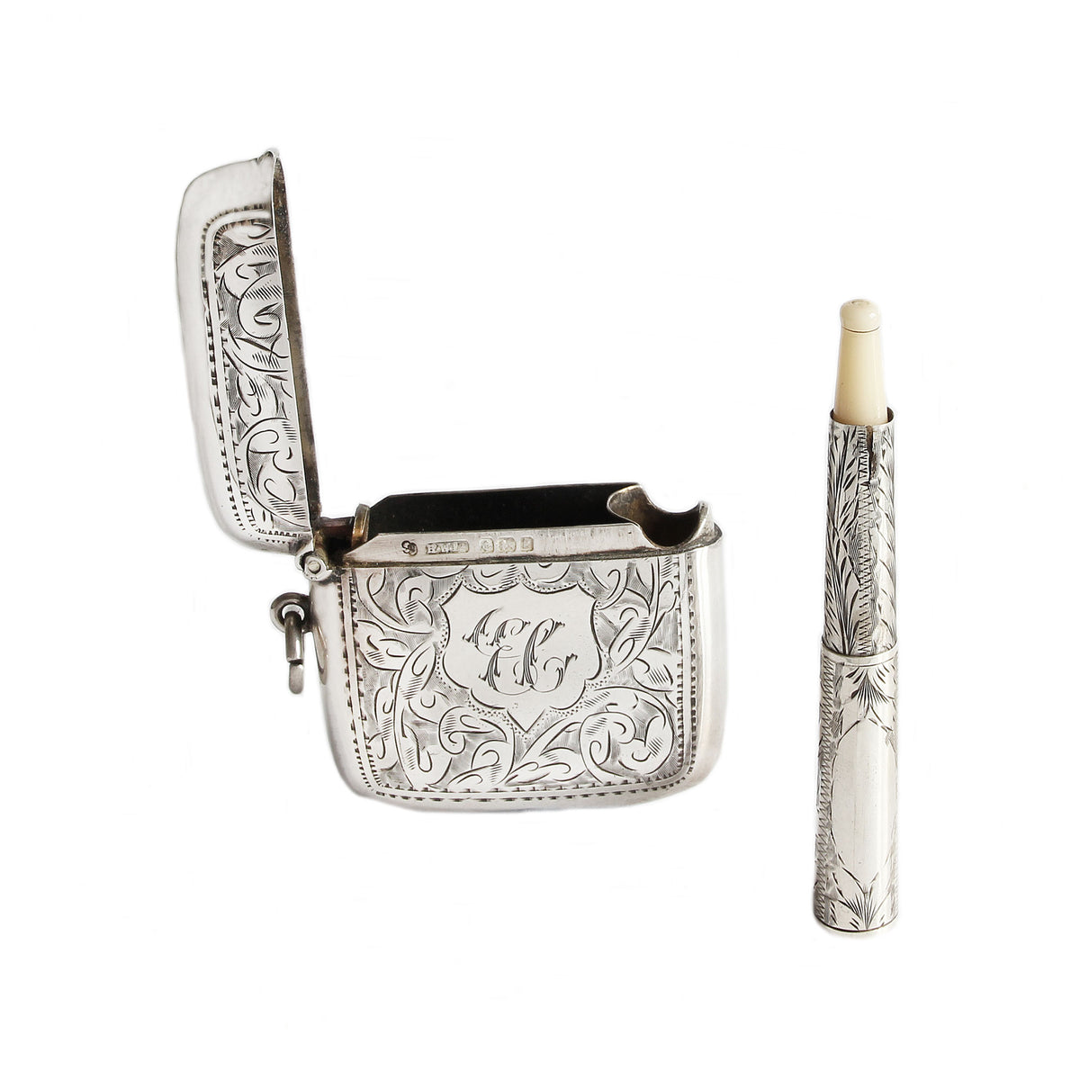 Silver vesta with candle on a white background