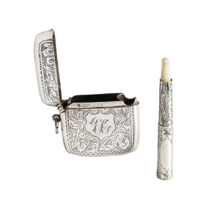 Silver vesta with candle on a white background