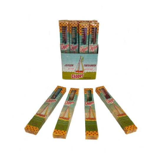 pack of junior tooth brush clipper brand with 4 displayed in front of box