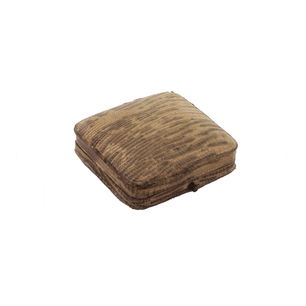 Brown textured square object on a white background