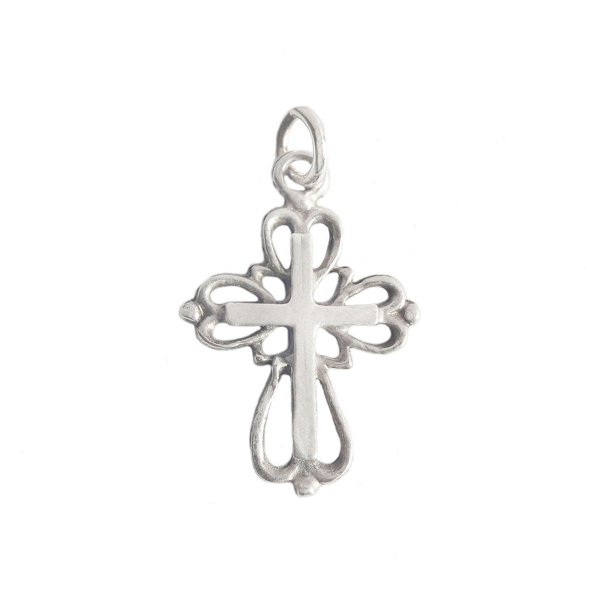 Silver cross pendant on a white background