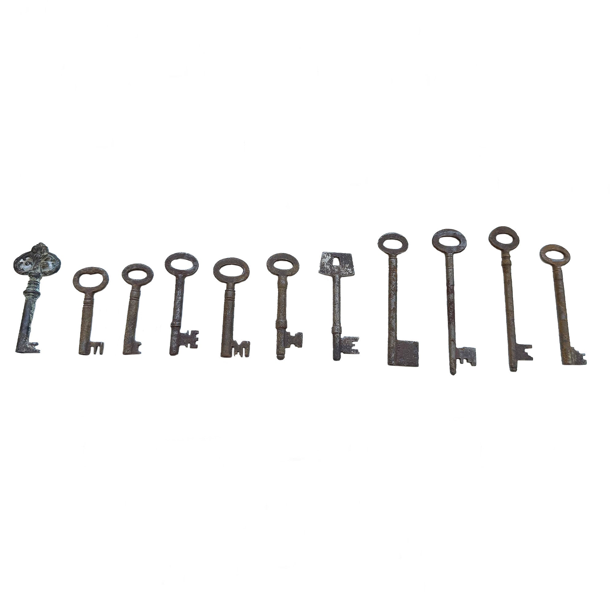 antique rusty set of keys in a line
