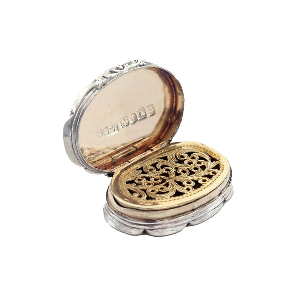 Decorative heart-shaped box with intricate design on a white background