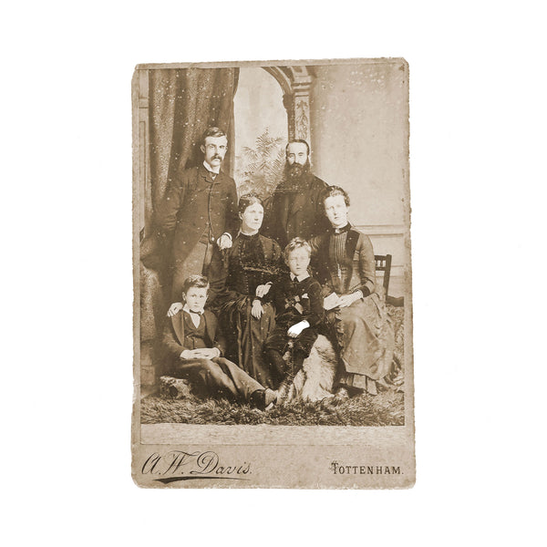 Vintage black and white photograph of a family portrait with 'A.W. Davis' and 'Tottenham' text.