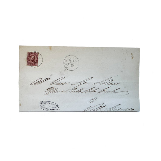 a letter handwritten in Italian with postage stamp folded up 