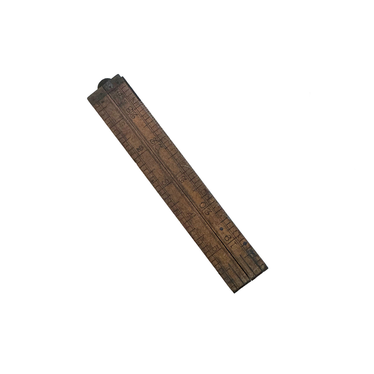 a vintage folded up wooden ruler