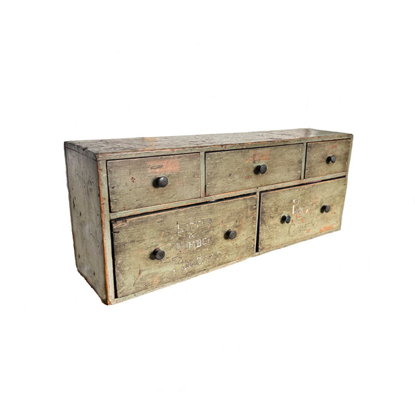 Wooden drawers with multiple drawers on a white background