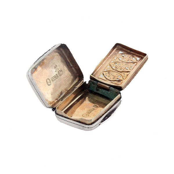 opened vinaigrette box with intricate designs on a white background