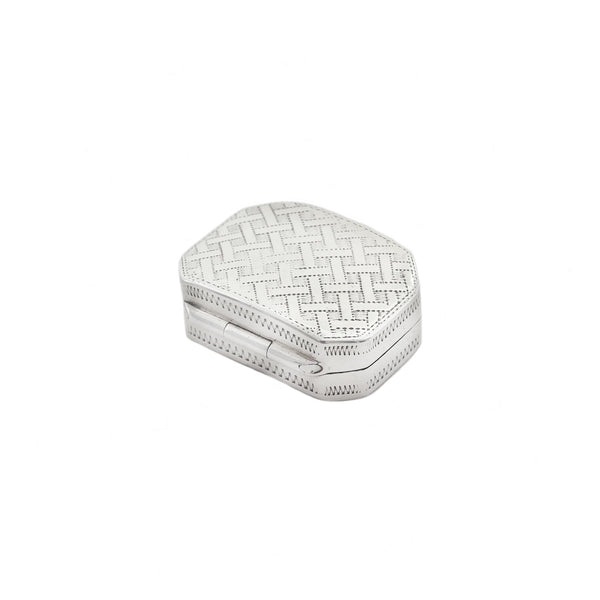 Hexagonal silver box with a herringbone pattern on a white background