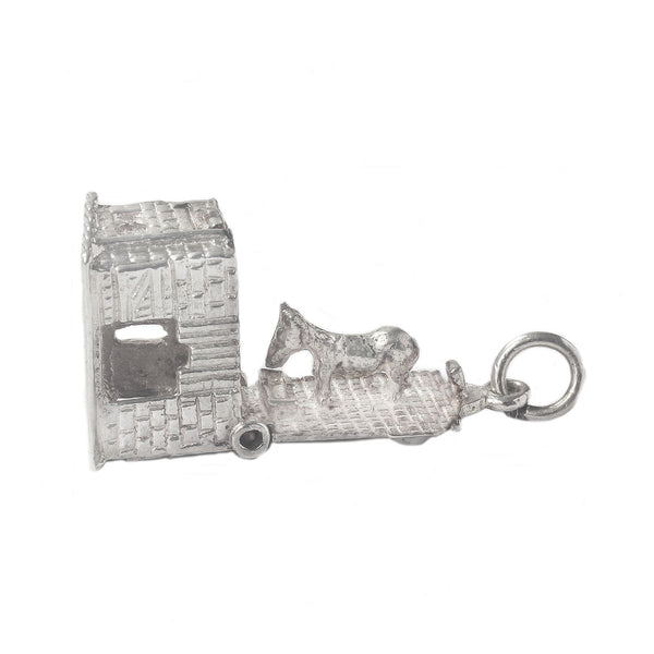 Silver charm of a horse box and horse on a white background