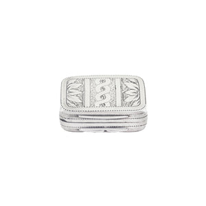 Silver vinaigrette with intricate patterns on a white background