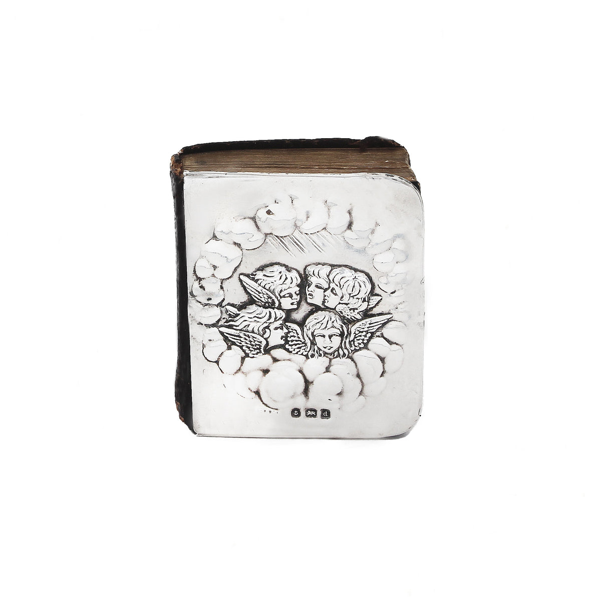Decorative book with angel designs on a white background