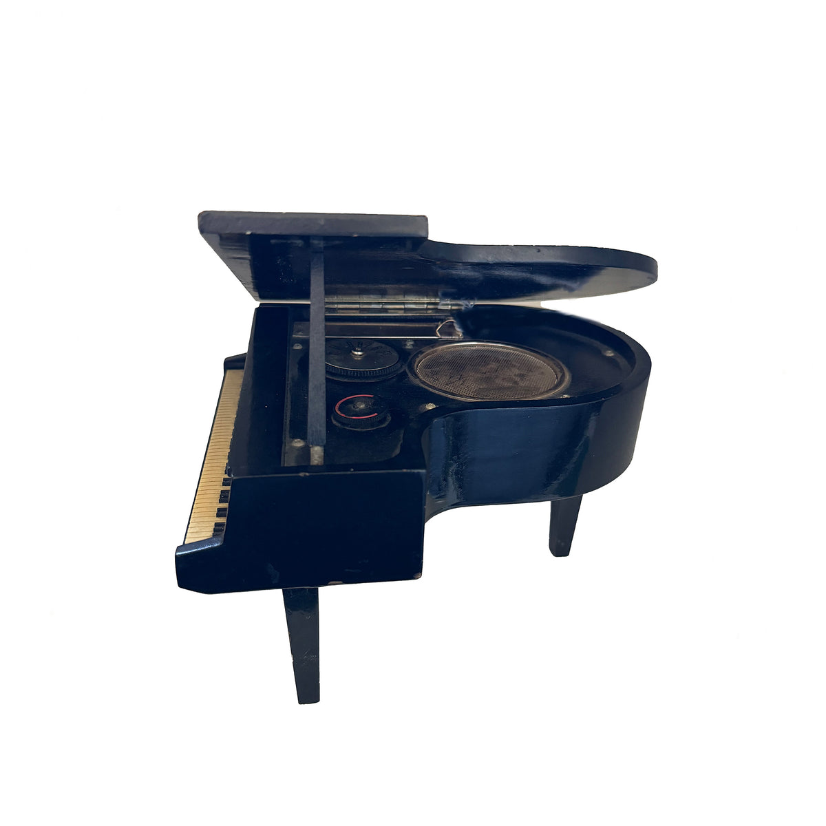 Black grand piano on a white background