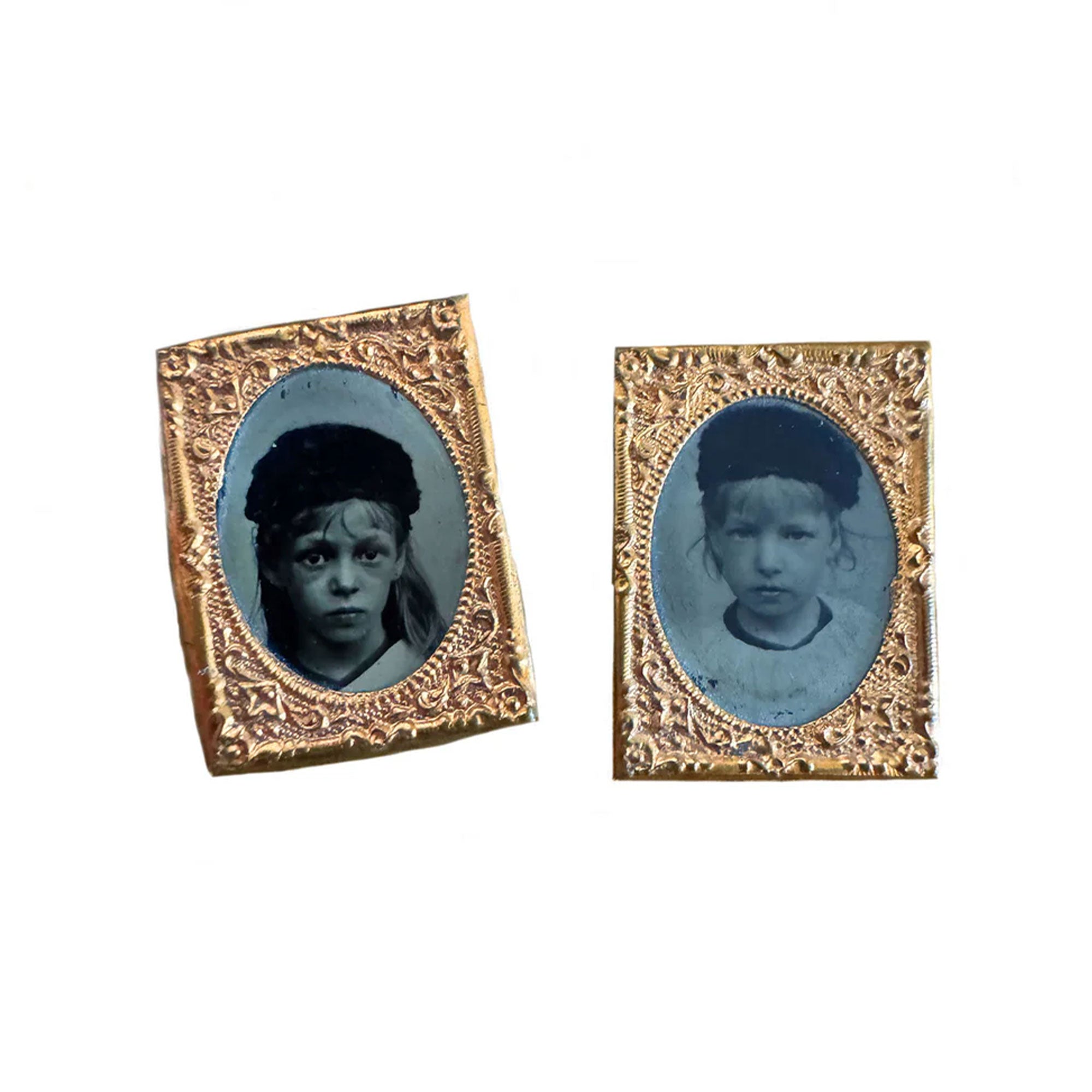 Two vintage portraits in ornate gold frames on a white background