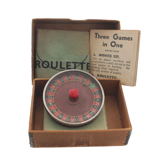 Vintage roulette game in a box with packaging and instructions.