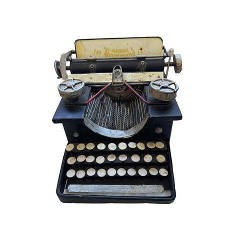 Vintage American Hammond typewriter, model No. 12, with a metal base and hand-painted keys, primarily in black color.