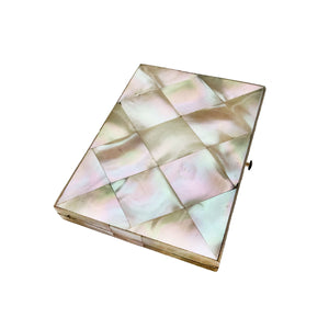 mother of pearl case with a geometric pattern on a white background