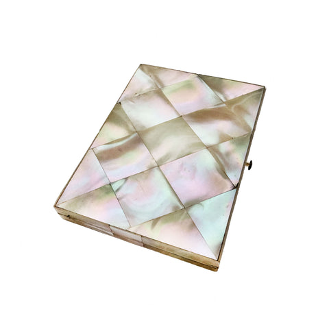 mother of pearl case with a geometric pattern on a white background