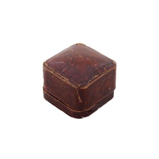 brown closed ring box white background