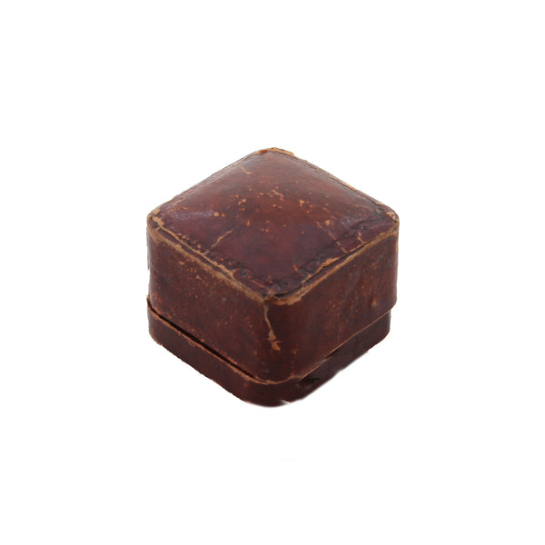 brown closed ring box white background