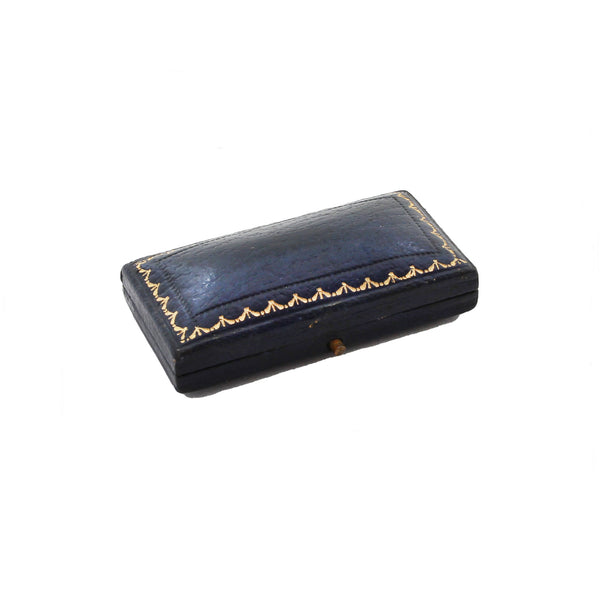 Decorative blue box with gold trim on a white background