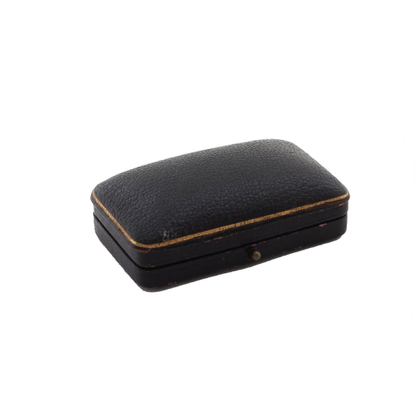 Black leather jewelry box on a white background