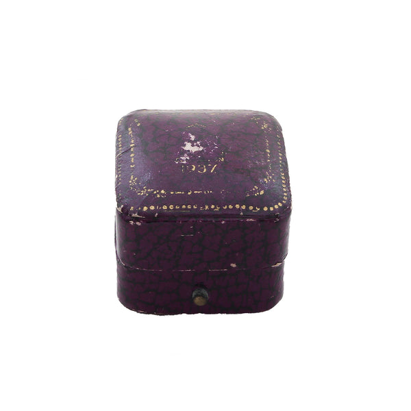 Small purple ring box with hinge and date of 1937
