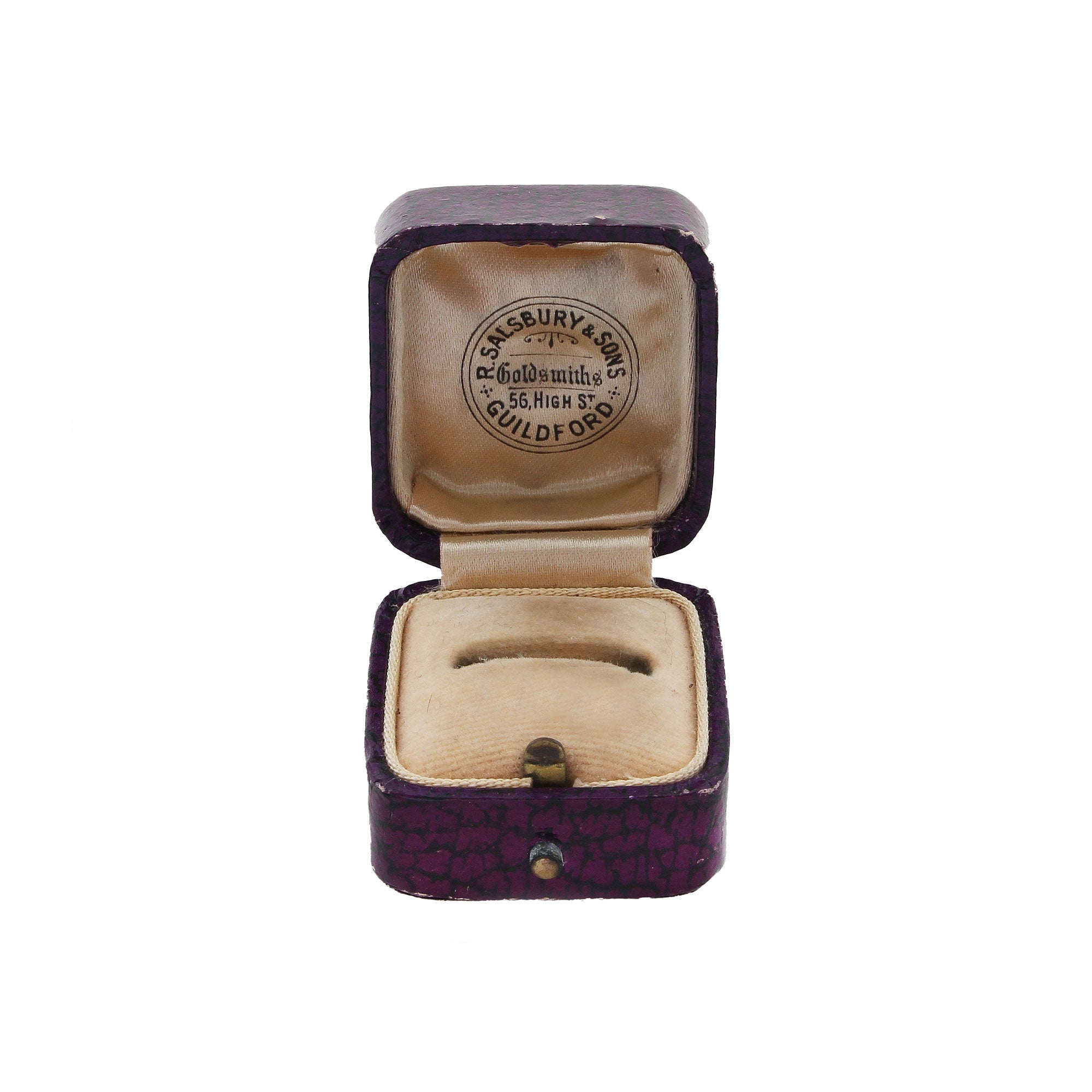 Open purple jewelry box with beige interior, featuring a brand logo on a white background