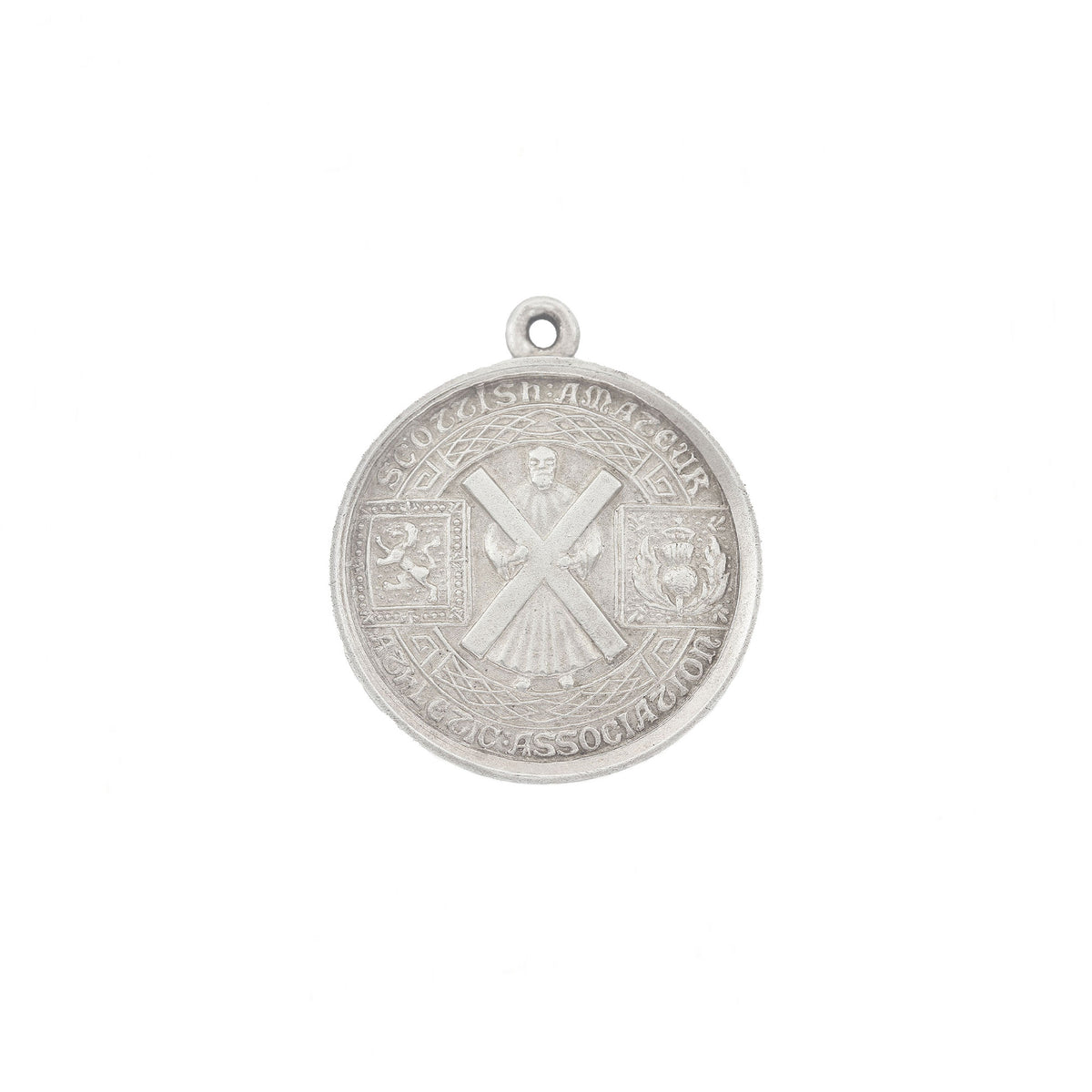 Silver pendant with intricate design on a white background