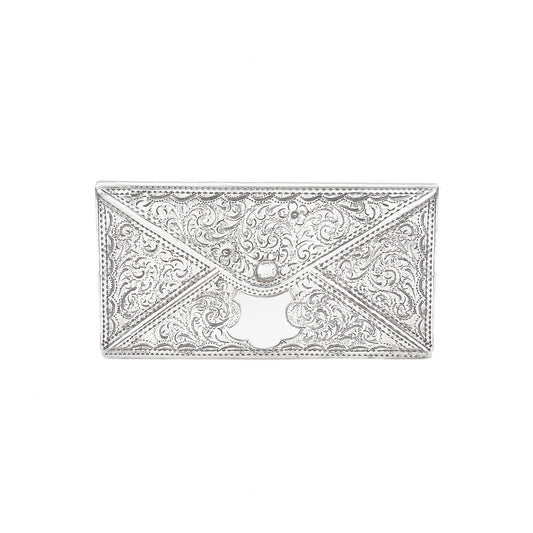 Decorative silver card case on a white background