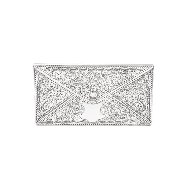 Decorative silver card case on a white background