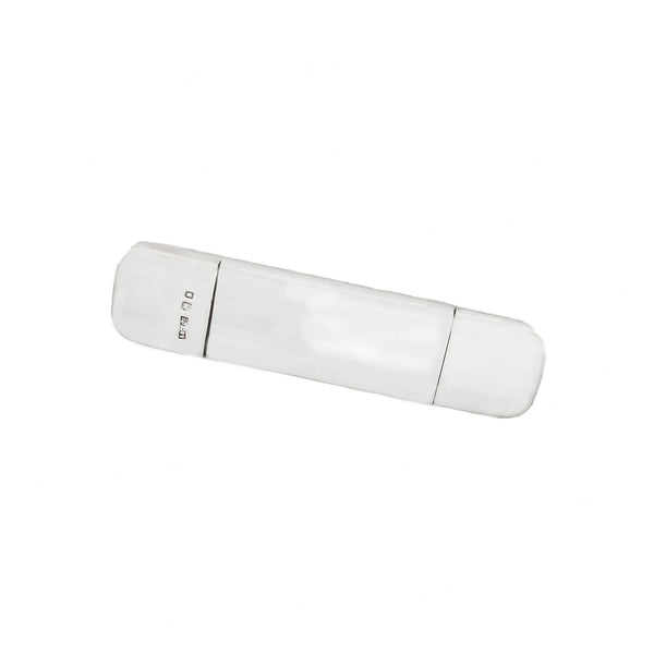 White comb case with hallmark on a white background