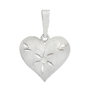 Silver heart-shaped pendant with floral cutouts on a white background