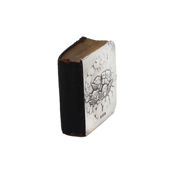 Small book with black and white design on a white background
