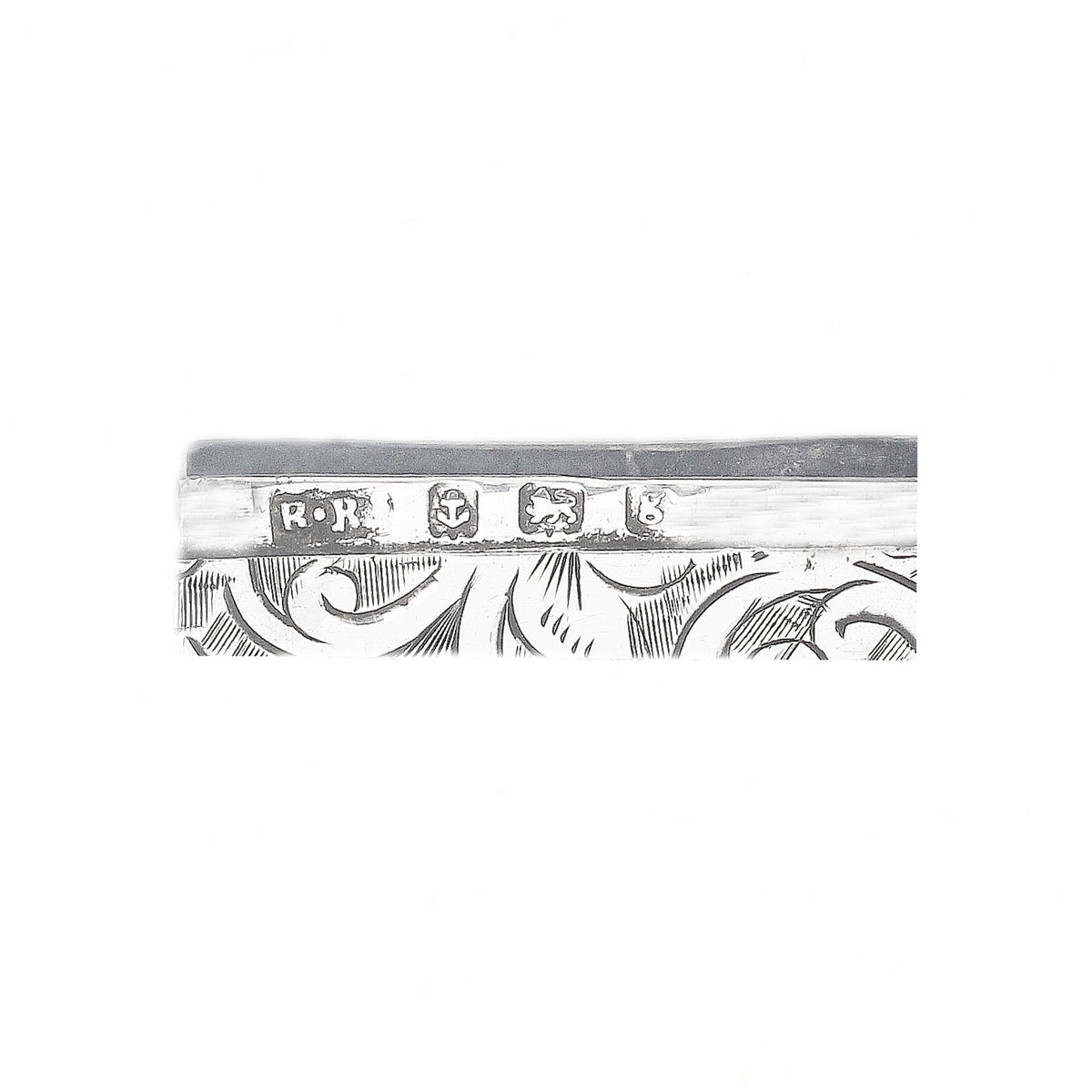 Decorative hallmark with intricate patterns and engraved designs on a white background