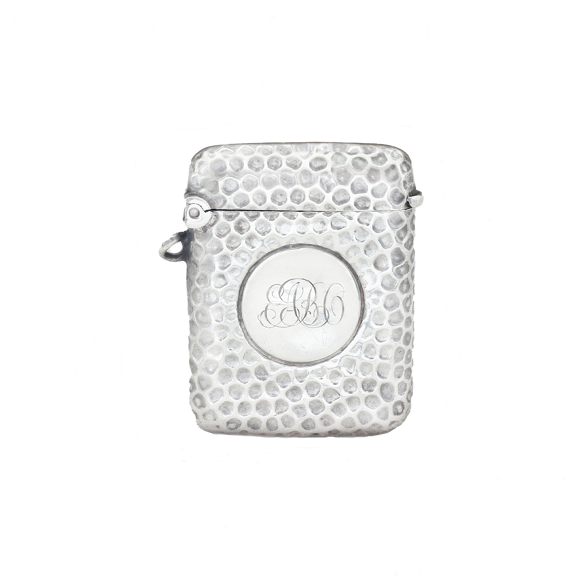 Silver textured vesta with monogram on a white background
