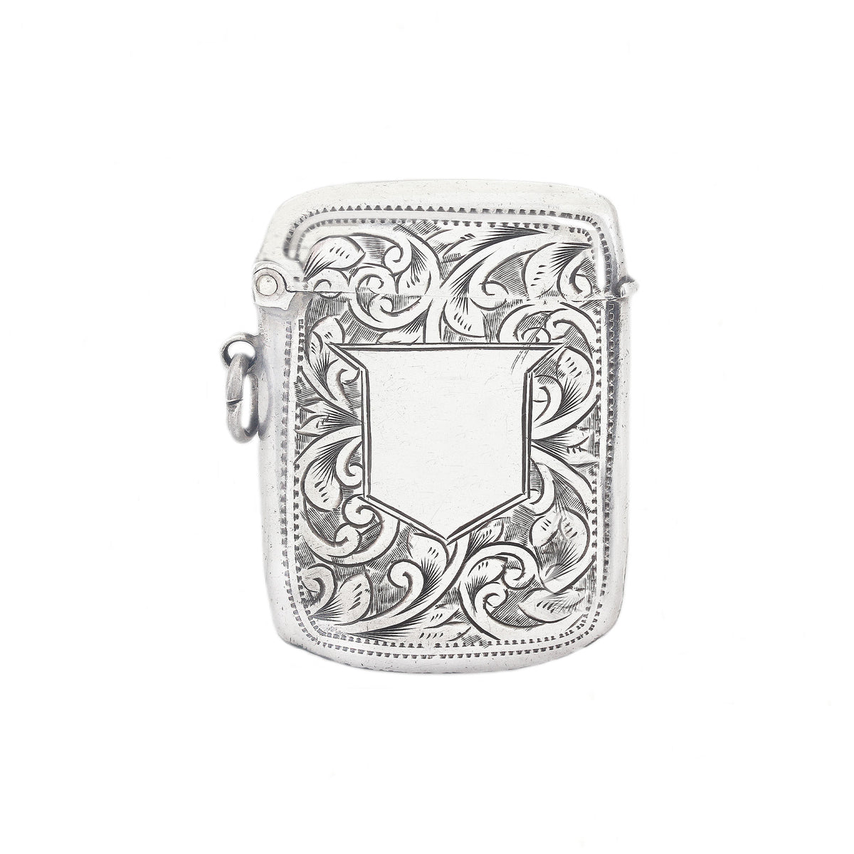Silver vesta case case with intricate floral patterns on a white background