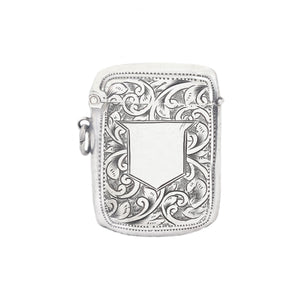 Silver vesta case case with intricate floral patterns on a white background
