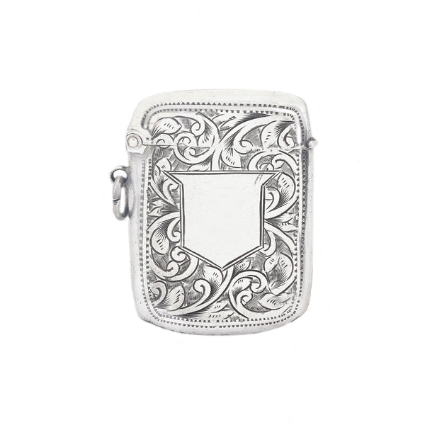 Silver vesta case case with intricate floral patterns on a white background