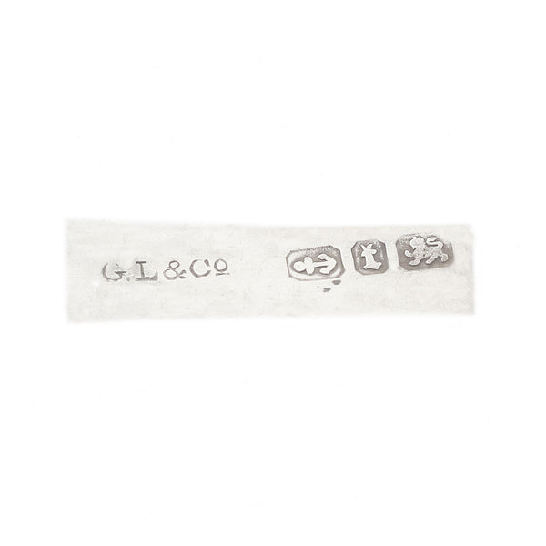 hallmark of silver raised brooch